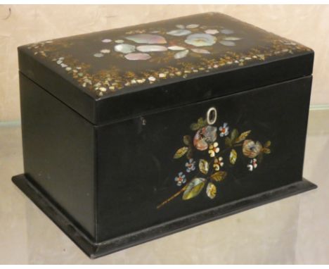 An Edwardian black lacquered tea caddy with inset mother of pearl decoration, 19 cm x 10 cm