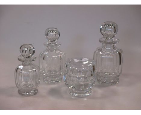 Baccarat, France: a c1940 crystal part dressing table set, of octagonal and faceted form, comprising: three graduated bottles