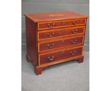 A George III mahogany and crossbanded chest of four long graduating drawers on bracket feet 79 x 86 x 47cm  