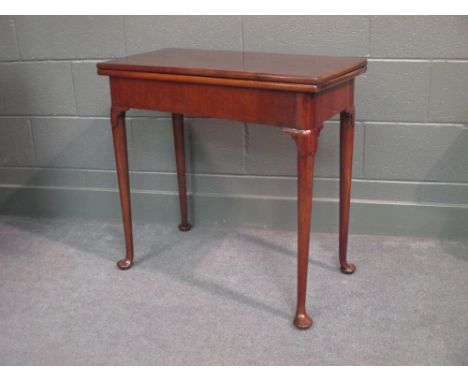 A late 18th century mahogany card table, the green felt lining with four dished counters on pad feet 73 x 75 x 37cm (closed) 