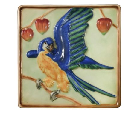 A Goldscheider Pottery plaque depicting a Parrot, the square plaque painted in colours, printed and impressed marks 23 x 23cm
