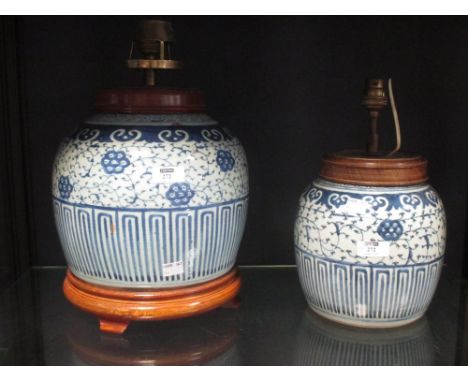 A 19th century Chinese blue and white ginger jar converted to a lamp, 28cm high inc. stand together with a smaller similar la