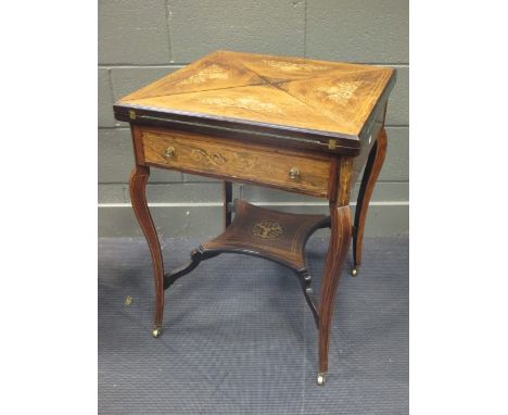 A Maple &amp; Co mahogany and marquetry envelope card table, stamped to the drawer 74 x 59 x 59cm  