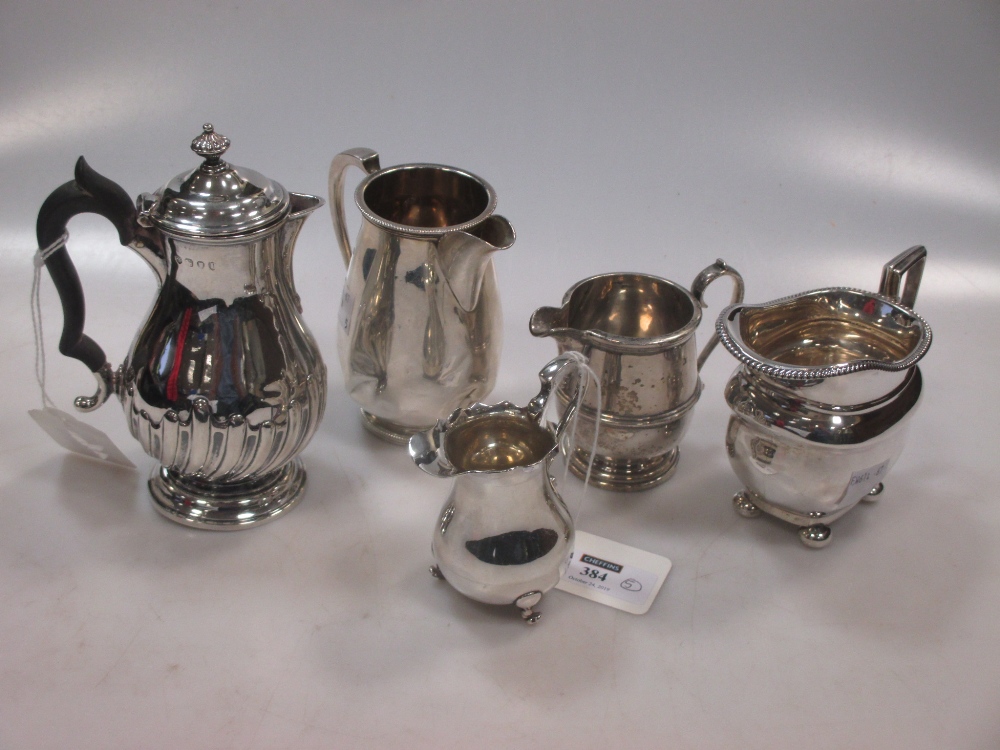 A collection of 5 silver milk and cream jugs, 18.5ozt gross (5) in