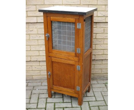 An oak and enamel meat safe  