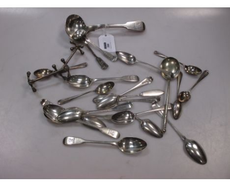 A collection of silver flatware, together with a silver plated spoon and a pair of silver plated knife rests, 14.3ozt weighab