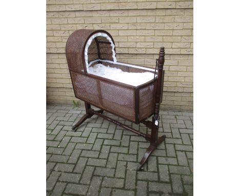 A 19th century mahogany cradle on stand  