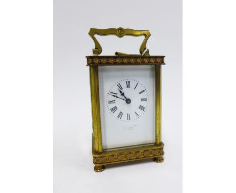 French carriage clock, brass case with glass panels, enamel dial with Roman numerals, inscribed Logan, Glasgow, height includ