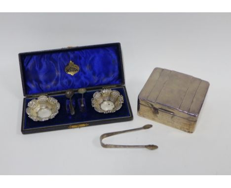 Silver box with engine turned lid, Birmingham 1954, 10cm, cased set of two Chester silver salts, London silver sugar tongs (3