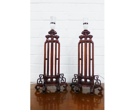 A pair of chinoiserie wooden table lamp bases, 47cm (2) 