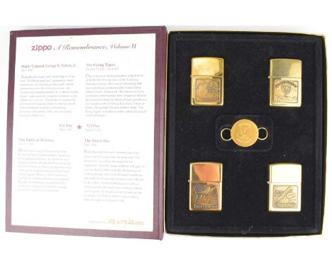 ZIPPO; a Remembrance WWII limited edition lighter set, no.03679/25000, comprising four lighters, including 'Flying Tigers', '