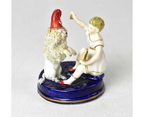 MINTON; a porcelain figure group of a girl with a poodle, modelled teaching it tricks, impressed number '340' to base, height