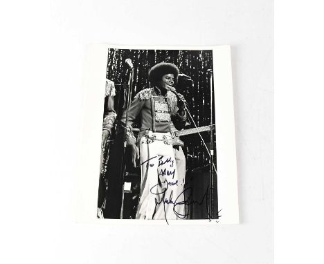 MICHAEL JACKSON; a black and white promotional photograph of the young Michael Jackson, signed and dedicated 'To Billy all my
