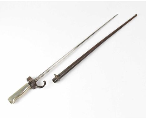 An M1895 pattern French spike bayonet with hooked quillon, stamped '87925', with further inspection marks visible and further