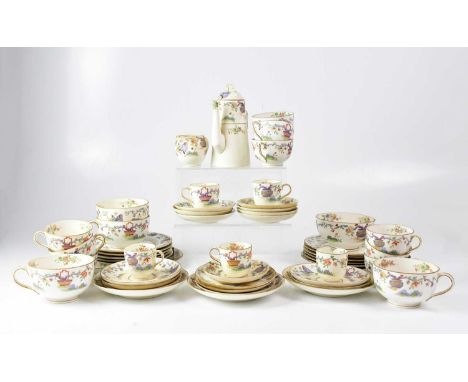 ROYAL WORCESTER; an Oriental-style floral tea service, with black back stamp, registered design no. 608482, comprising cups, 