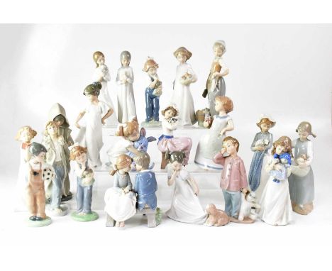 NAO; twenty figures of children in various outfits, height of largest 26cm (20).Condition Report: Unfortunately the lot is to