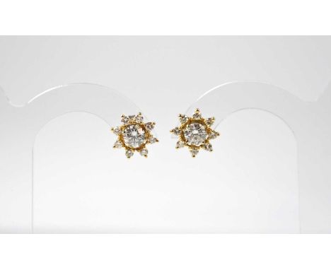 A pair of 18ct gold diamond and stud earrings in the form of three interchangeable parts, comprising a pair of 14ct white gol