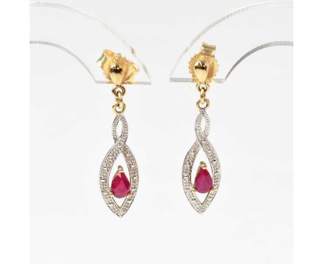 A 9ct gold necklace and matching pair of drop earrings set with a ruby within a white gold diamond set twist mount, stamped '