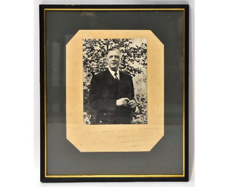 CHARLES DE GAULLE; a black and white portrait photograph of Charles de Gaulle, with personalised note dated 1957 'To Pour le 