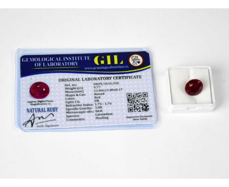 A loose 9.77 carat round ruby with GIL laboratory certificate.