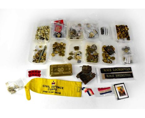 A fine and extensive collection of British and world military buttons, cap badges, uniform badges and officers' dress buttons
