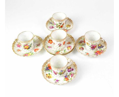 DRESDEN; a gilt-heightened floral part tea service, comprising five cups and six saucers (11).Condition Report: - Rubbing to 