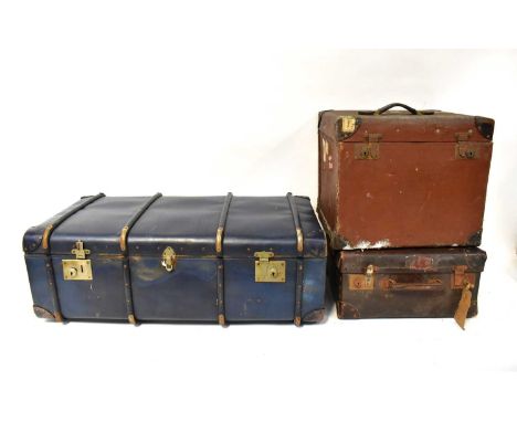 THE NATIONAL; a leather-bound canvas dome-topped travel trunk, painted with initials 'FMC', and three further vintage travel 