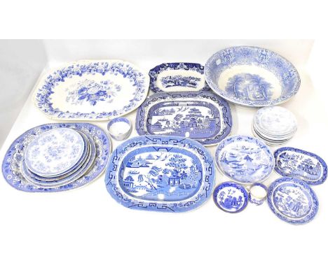 A quantity of 19th century blue and white transfer printed pottery, mostly Willow pattern or variation, to include meat platt