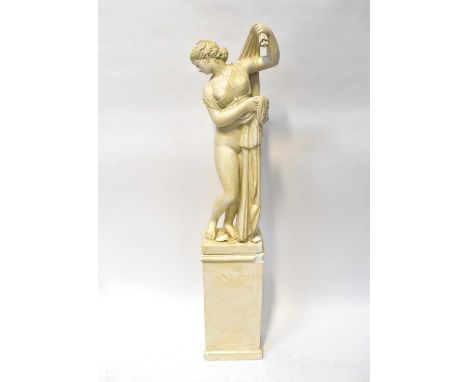 A contemporary plaster sculpture of a scantily clad young lady, mounted on a plinth base, height 144cm (af).Condition Report: