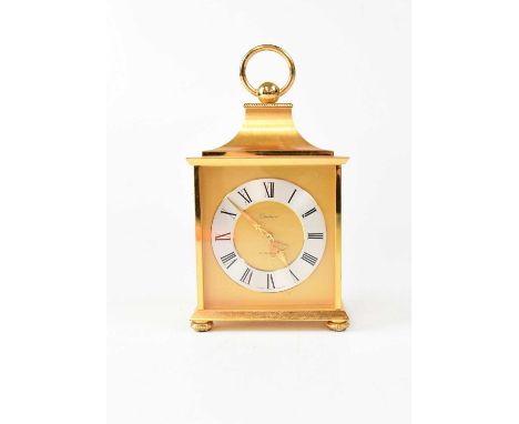 BUCHERER; a brass cased carriage-type clock, with wind-up mechanism, height 18cm.Condition Report: - Please note that this lo