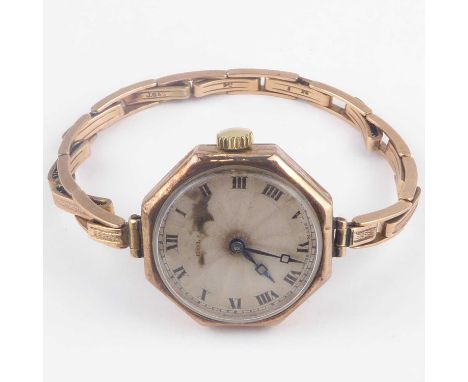 ROLEX; a ladies' 9ct gold wristwatch, the silvered dial set with Roman numerals and 'Rolex' under 12 o'clock, the octagonal b