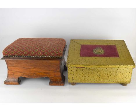 An Arts &amp; Crafts style oak footstool with storage compartment and upholstered top, 23 x 36 x 25cm, together with a brass 