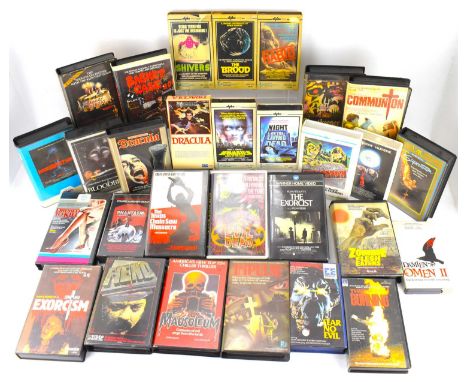 HORROR; a collection of approximately twenty-nine original VHS cassettes, to include 'The Texas Chainsaw Massacre' (uncensore