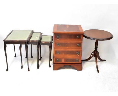 Five pieces of Regency-style and other reproduction furniture, comprising a small chest of drawers, a nest of tables, an oval