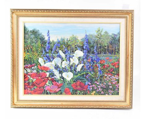JOHN POWELL; a limited edition coloured print on canvas, lilies, poppies and other flowers in a garden, signed and numbered l