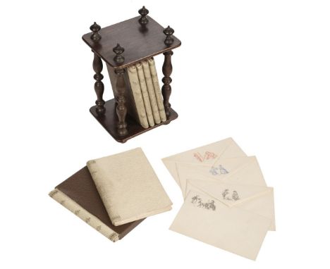 Stationery Set. A child's set of notecards and envelopes in wooden stand, circa 1890s, 6 sets of notecards with picture to to