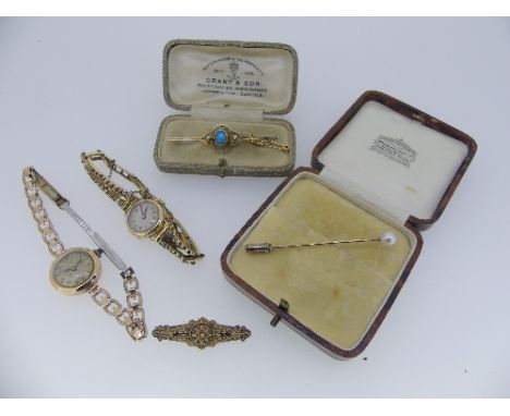 A 9ct yellow gold Bar Brooch, set in the centre with an oval opal, with a seed pearl on either side, in fitted case, together