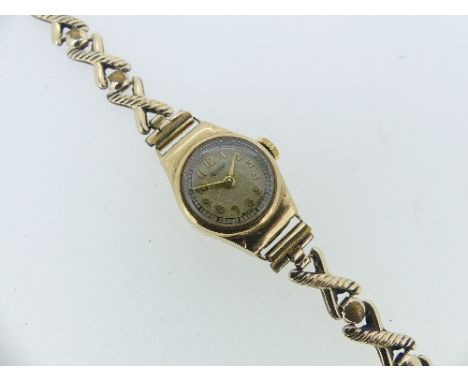 A Rotary 9ct gold ladies Wristwatch, with circular dial and gilt Arabic numerals, on 9ct gold Everluxe bracelet, gross weight