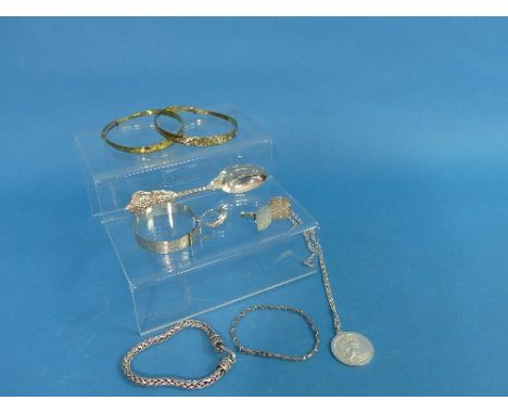 A small collection of Silver Jewellery, including a St. Christopher pendant and chain, a child's bangle, narrow ropetwist bra