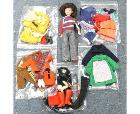 A 1960's Pedigree Sindy Doll, brunette, made in Hong Kong, together with a quantity of Sindy labelled clothing including some