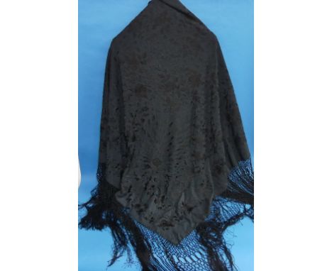 Chinese textiles: an early 20thC Chinese black embroidered Piano Shawl,  the black ground embroidered in black silk threads w