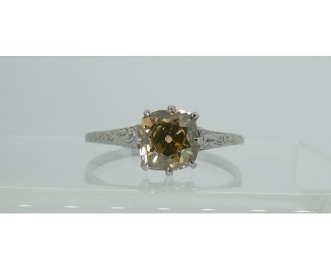 A yellow diamond solitaire Ring, of light yellow / orange tones, the Old Mined Cut stone circa 1½ct, all mounted in unmarked 