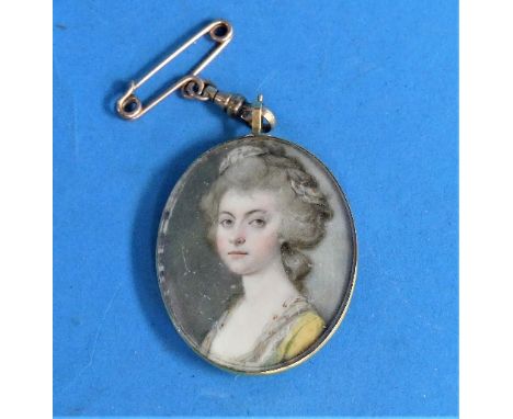 Attrib. to Joseph Daniel (British, 1758-1803), a miniature portrait of a lady, oval, watercolour, in a gilt metal frame with 