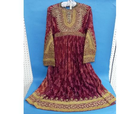 Vintage textiles: an early 20thC Ottoman dark red silk &amp; cut velvet smock Dress with elaborate embroidered gold threadwor