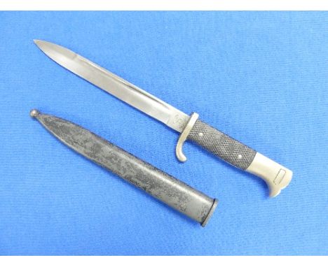 A German W.W.2 period SS Parade Bayonet, and scabbard, the 7½in (19cm) blade signed Emil Voos Solingen.