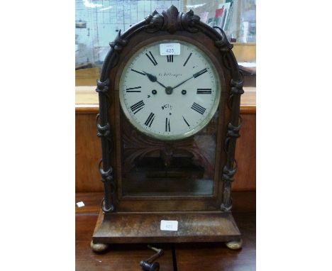 A 19th century mahogany 8-day Mantel Clock, of arched form with 8in (20.25cm) diameter dial signed G. Fillinger, Ely, black R