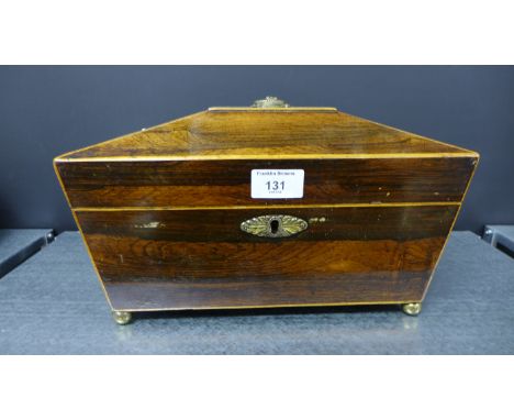 19th century stained wood tea caddy of sarcophagus form, with brass handle, escutcheon and four bun feet, 31 x 19cm