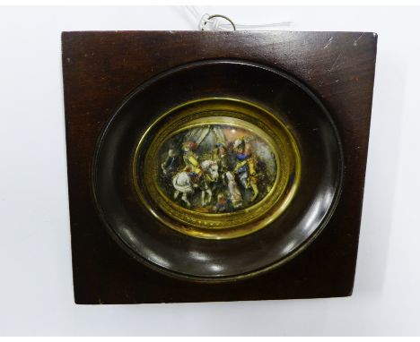 A mahogany framed oval portrait miniature depicting a scene in relief of soldiers on horseback alongside civilian figures, pa