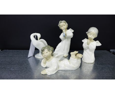 A group of three Lladro, Spanish porcelain cherub figures, together with a Lladro swan (4)