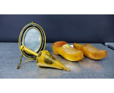 A mixed lot to include a pair of miniature carved wood clogs, Mauchline umbrella pin cushion and an oval frame (3) 
